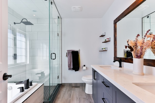 A modern bathroom with a clear glass shower