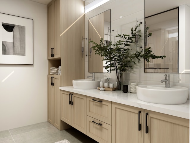 A bathroom with a white ceramic sink