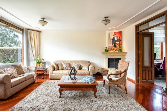 A remodeled cozy sun lit living room