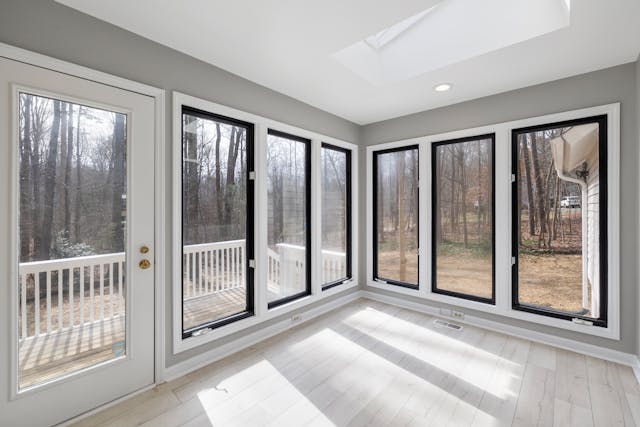 A deck with indoor kitchen