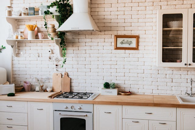 A white kitchen with white bricks