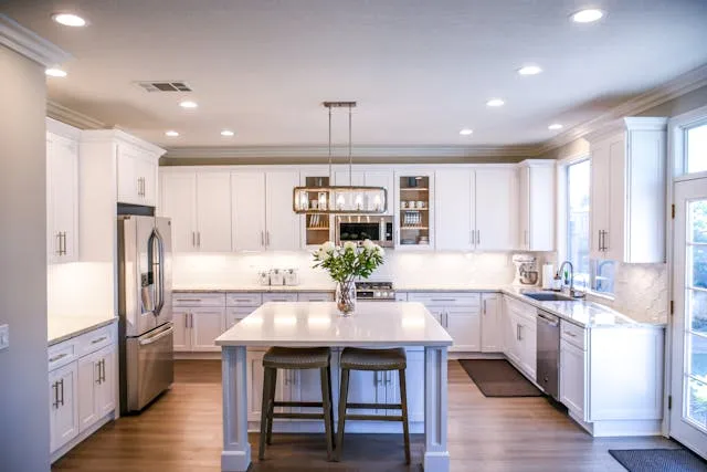 A beautiful gray lit kitchen side view