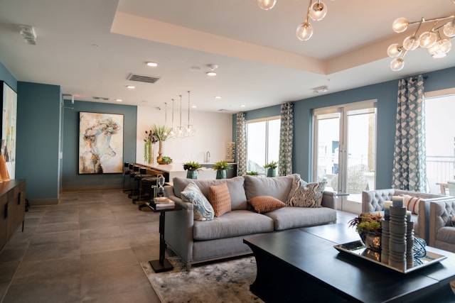 A green living room with a dining room