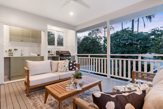 An outdoor covered patio with bbq area