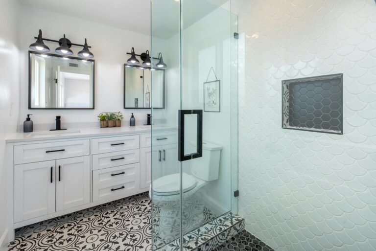 A bathroom tiled white