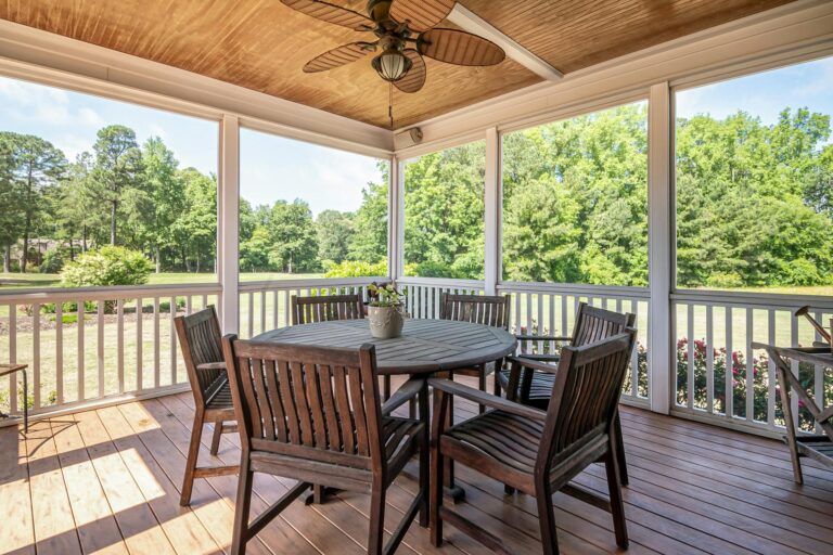 Wooden patio with round table